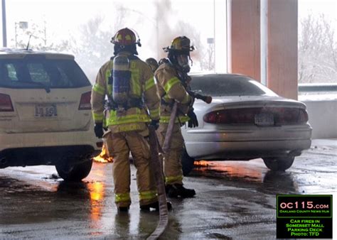 Fire breaks out in Troy parking garage